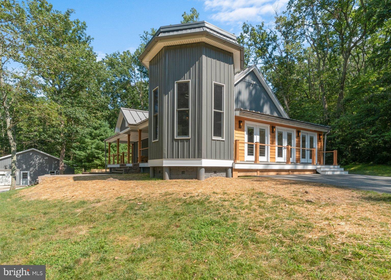 851 Bacon Hall Road Sparks, MD 21152 - Photo 4 of 50 Modern home nestled in a serene landscape.