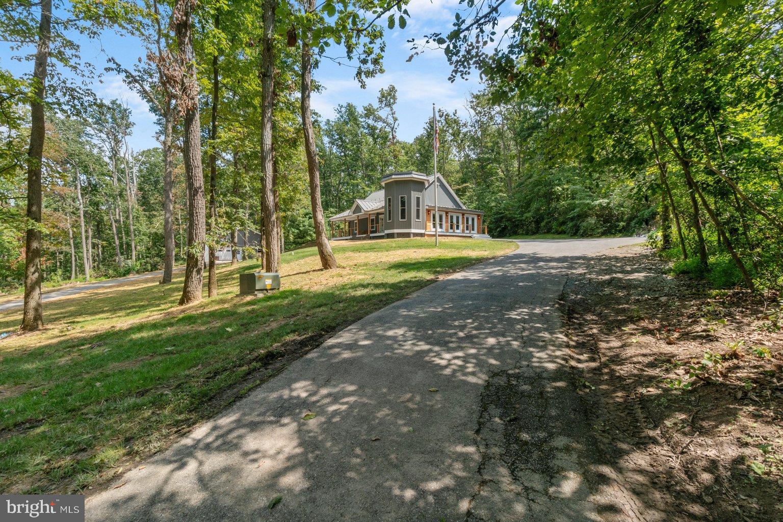851 Bacon Hall Road Sparks, MD 21152 - Photo 5 of 50 Serene home nestled among lush trees.