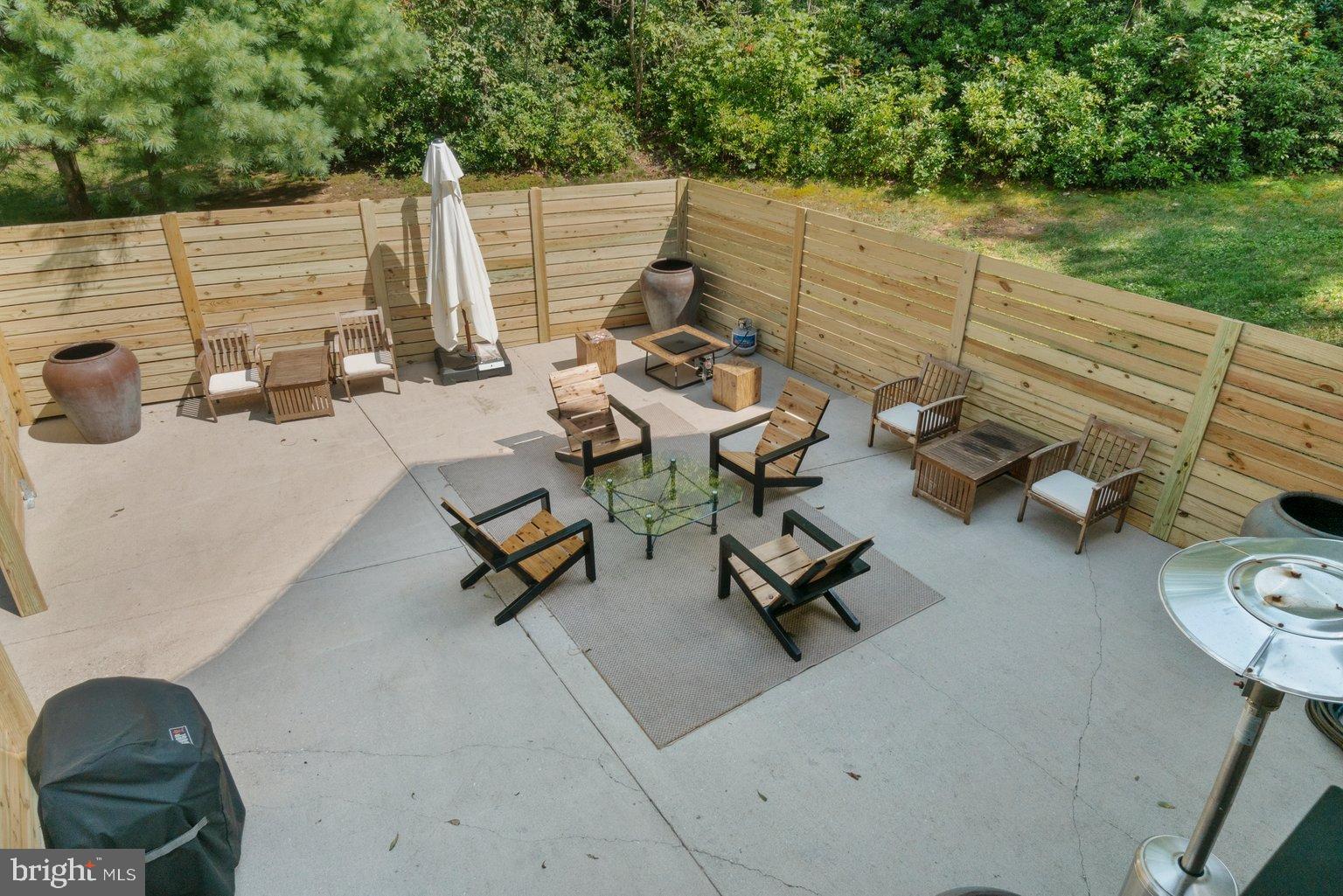 851 Bacon Hall Road Sparks, MD 21152 - Photo 6 of 50 Serene outdoor retreat with cozy seating.