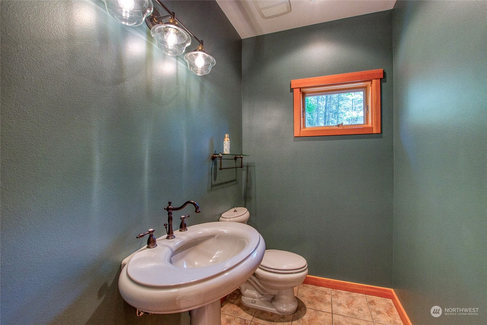 2270 Spring Point Road Orcas Island, WA 98245 - Photo 12 of 40 a bathroom with a toilet sink and mirror