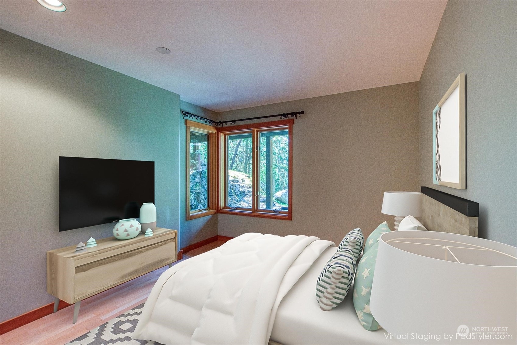 2270 Spring Point Road Orcas Island, WA 98245 - Photo 23 of 40 a bedroom with a bed and a flat screen tv