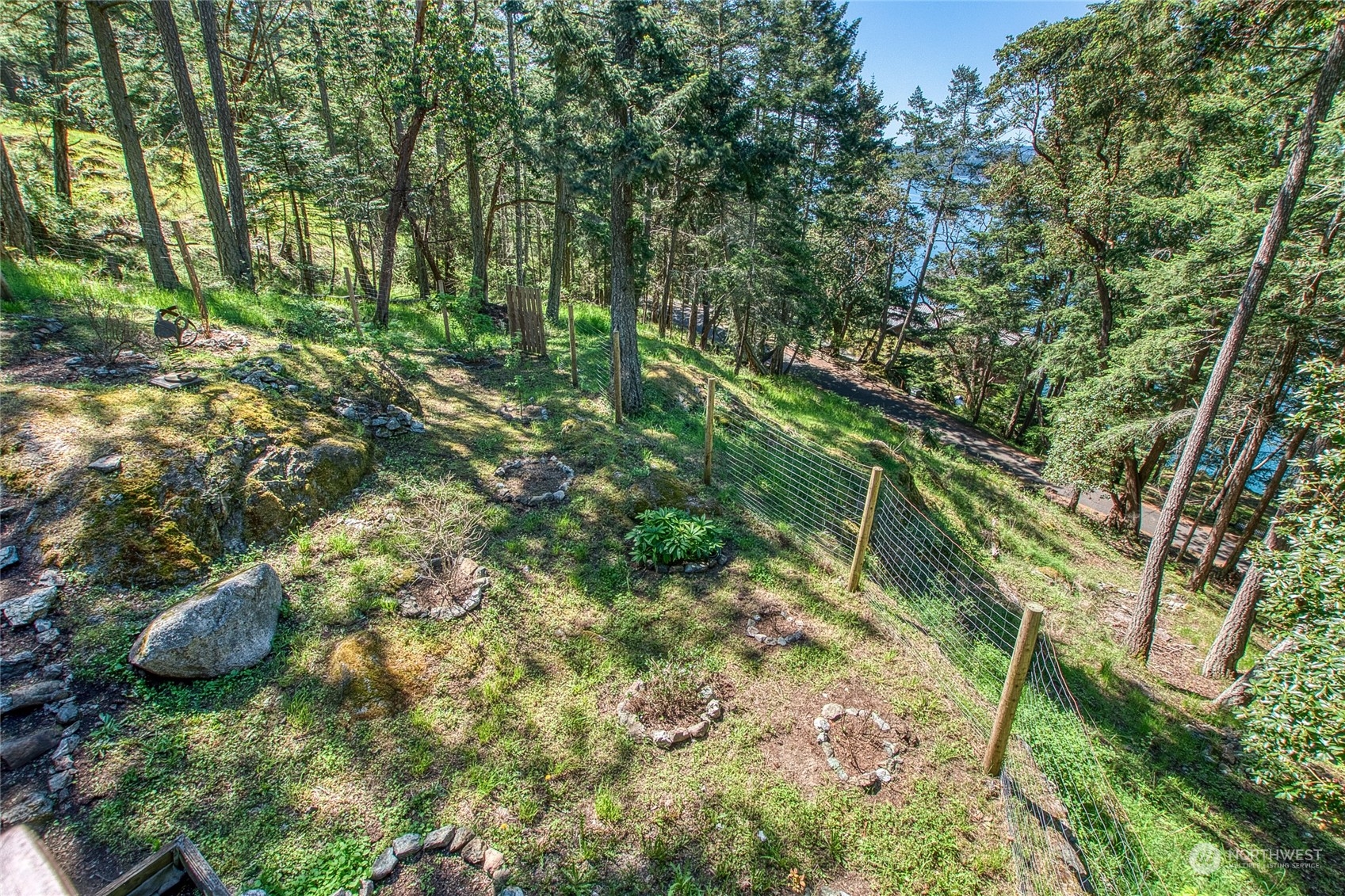 2270 Spring Point Road Orcas Island, WA 98245 - Photo 33 of 40 a backyard of a house with lots of green space