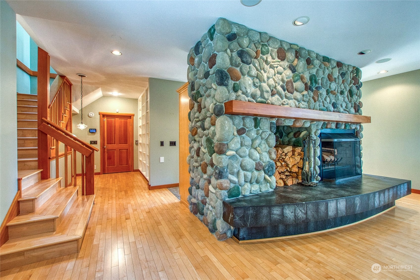 2270 Spring Point Road Orcas Island, WA 98245 - Photo 4 of 40 a view of a living room with a wooden floor