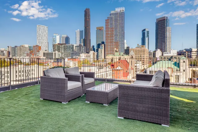 a living room with furniture and a garden