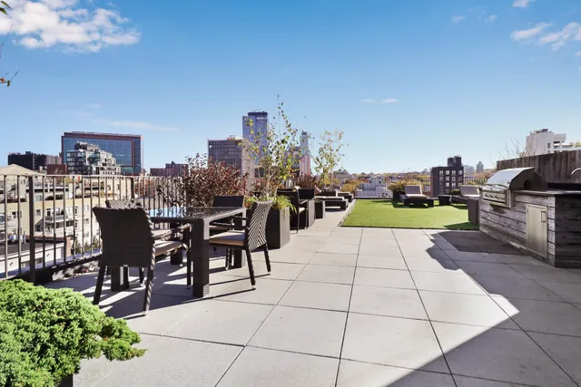 a view of a terrace with sitting area