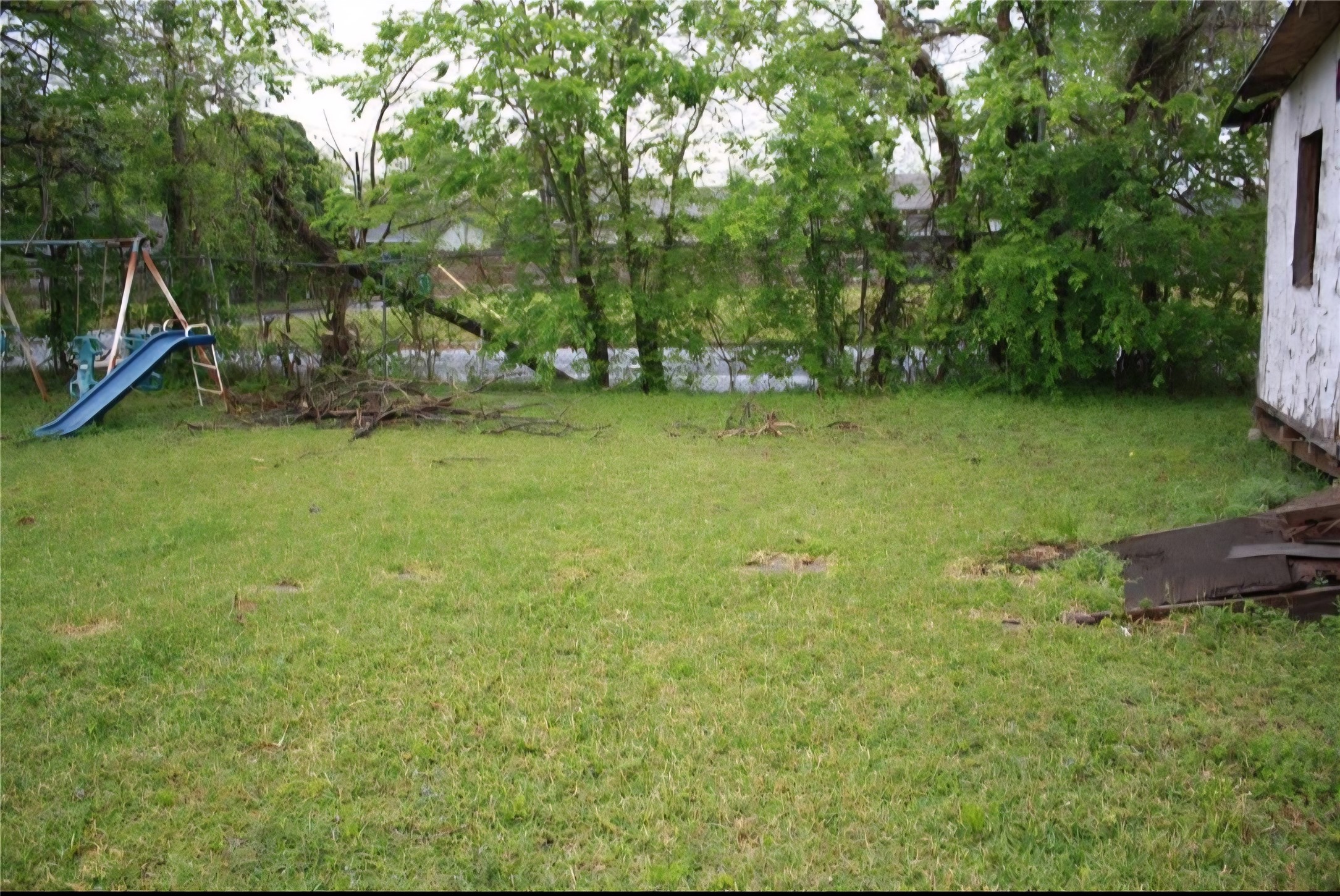 1403 East 36th Street Houston, TX 77022 - Photo 4 of 6 a view of outdoor space with deck and yard