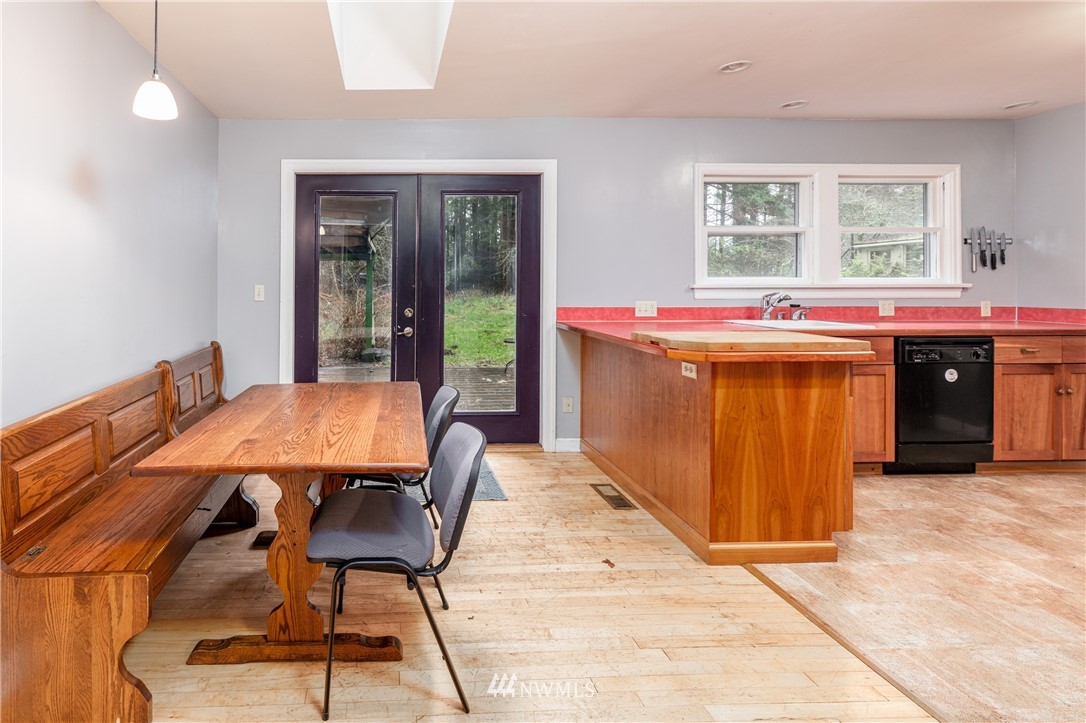 4004 Cooper Point Road Northwest Olympia, WA 98502 - Photo 11 of 28 a dinning table and chairs in a room