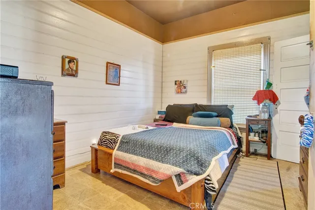 a view of a yoga room with furniture and windows