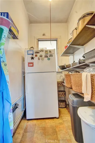 a view of a livingroom with furniture and front door
