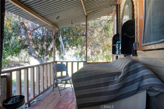a white toilet sitting next to a white sink