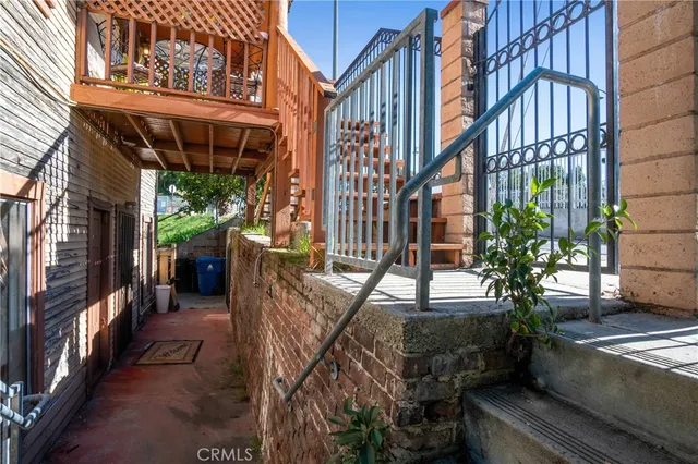 a house that has a tree in front of the house