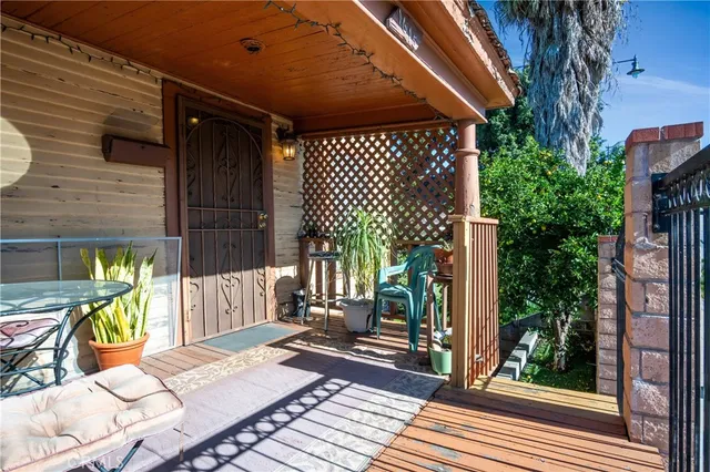 a view of backyard with large tree