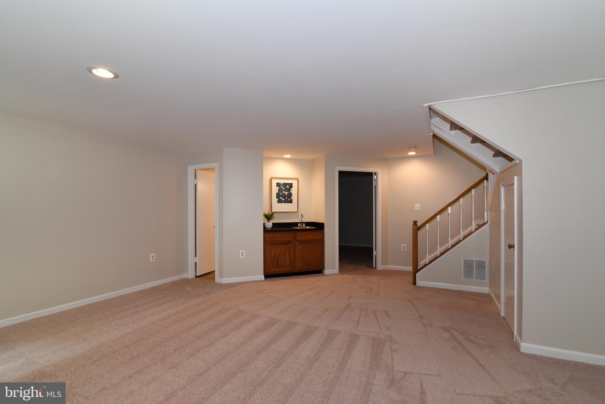 11940 Sentinel Point Court Reston, VA 20191 - Photo 36 of 43 Another view of the Rec Room with recessed lights.