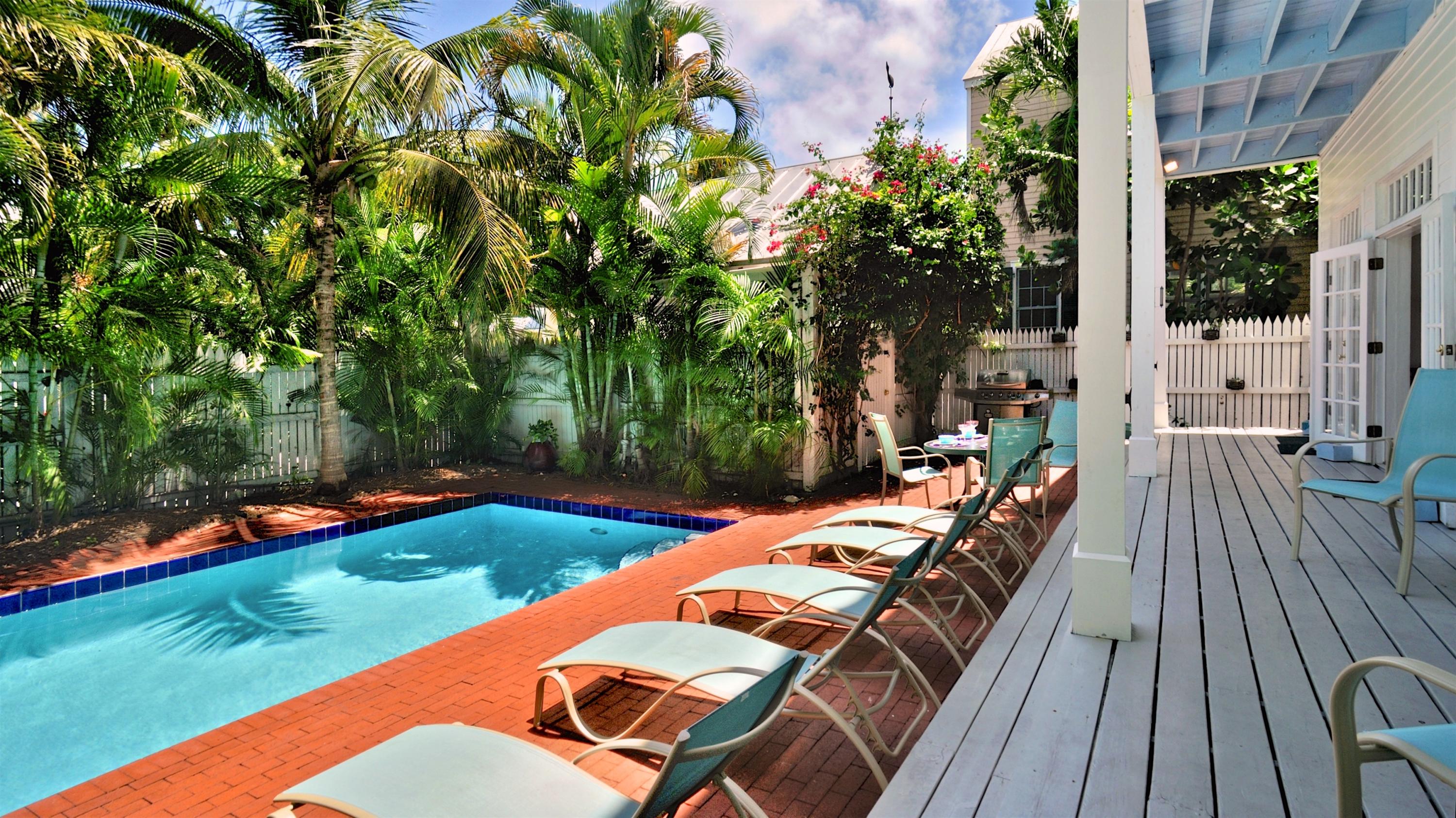58 Front Street Key West, FL 33040 - Photo 2 of 28 swimming pool view from a balcony with seating space