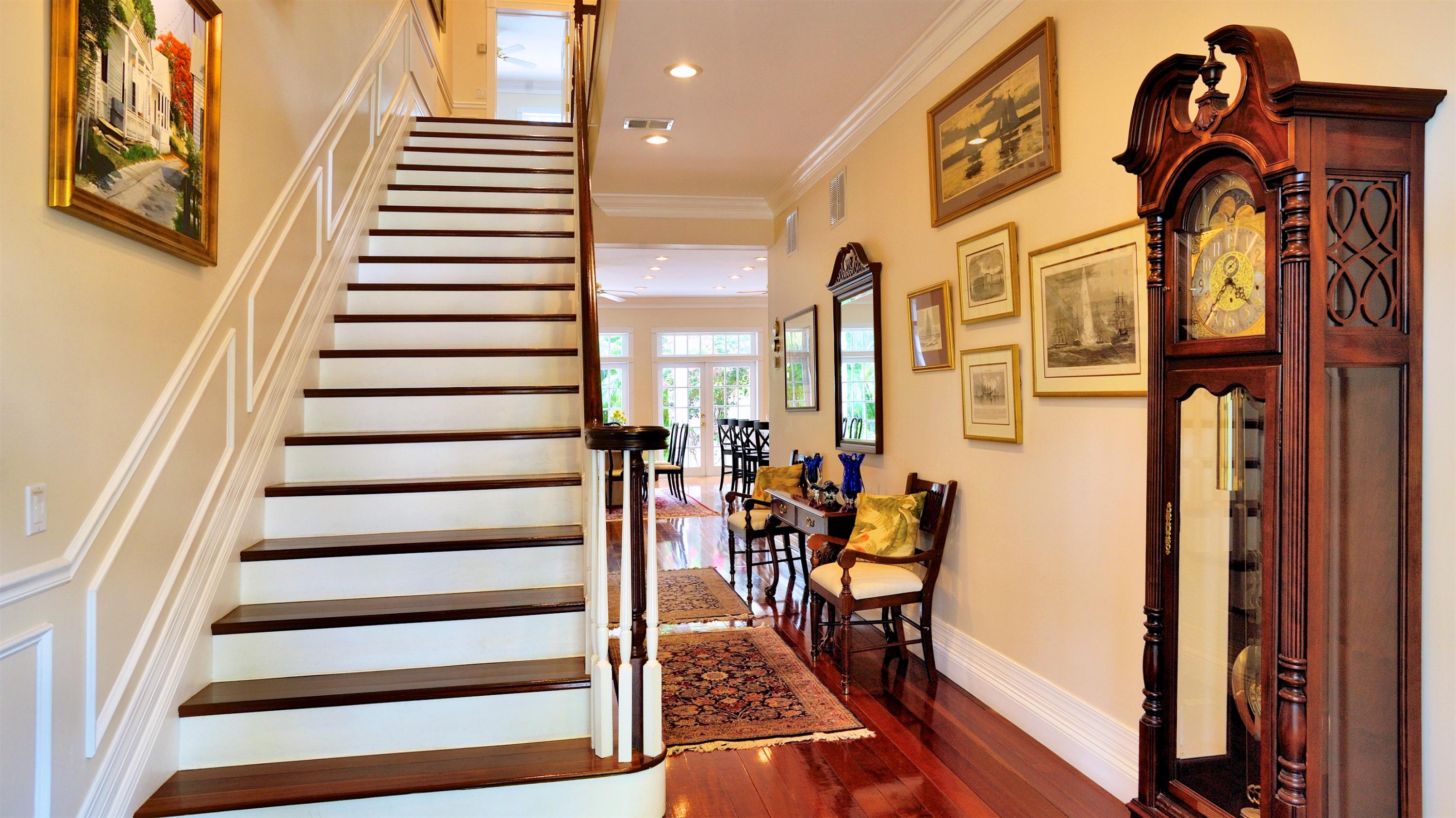 58 Front Street Key West, FL 33040 - Photo 10 of 28 a view of balcony and dining room with furniture