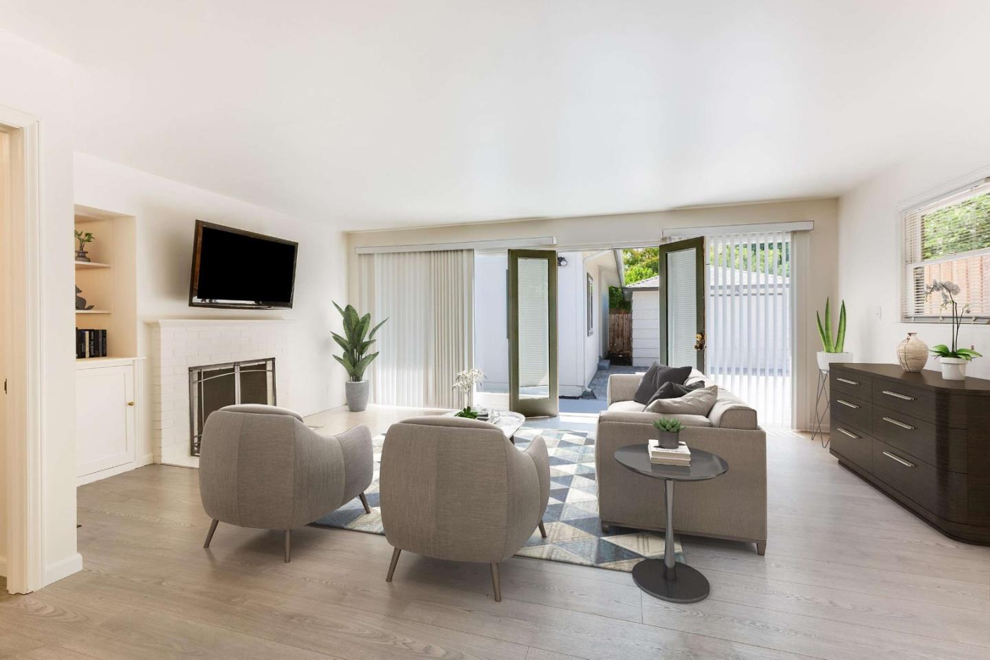 2360 Middlefield Road Palo Alto, CA 94301 - Photo 3 of 18 a living room with furniture fireplace and flat screen tv