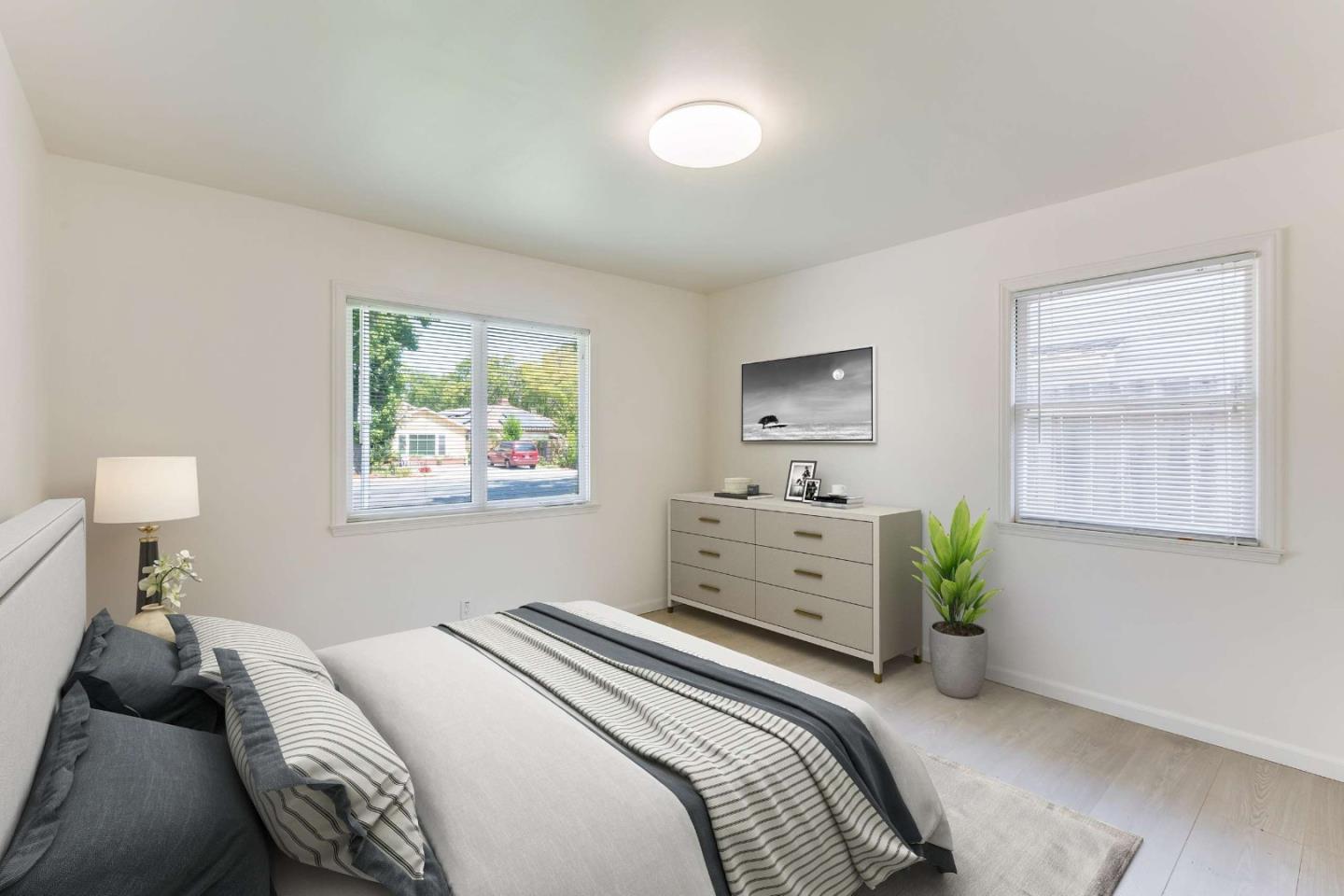 2360 Middlefield Road Palo Alto, CA 94301 - Photo 4 of 18 a bedroom with a bed and a window