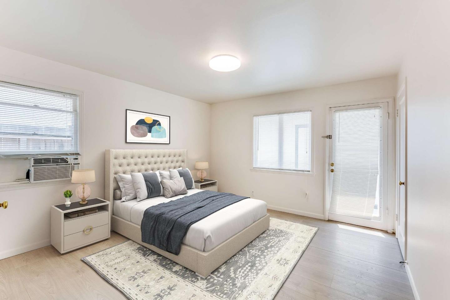 2360 Middlefield Road Palo Alto, CA 94301 - Photo 5 of 18 a bedroom with a large bed and a window