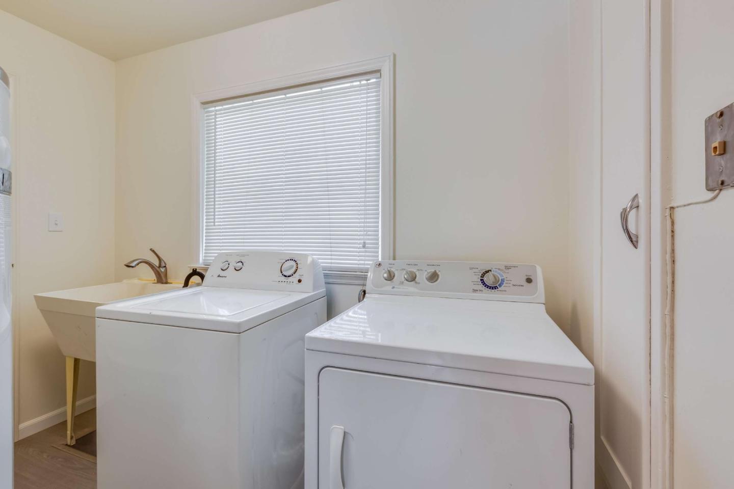 2360 Middlefield Road Palo Alto, CA 94301 - Photo 8 of 18 a utility room with dryer and washer
