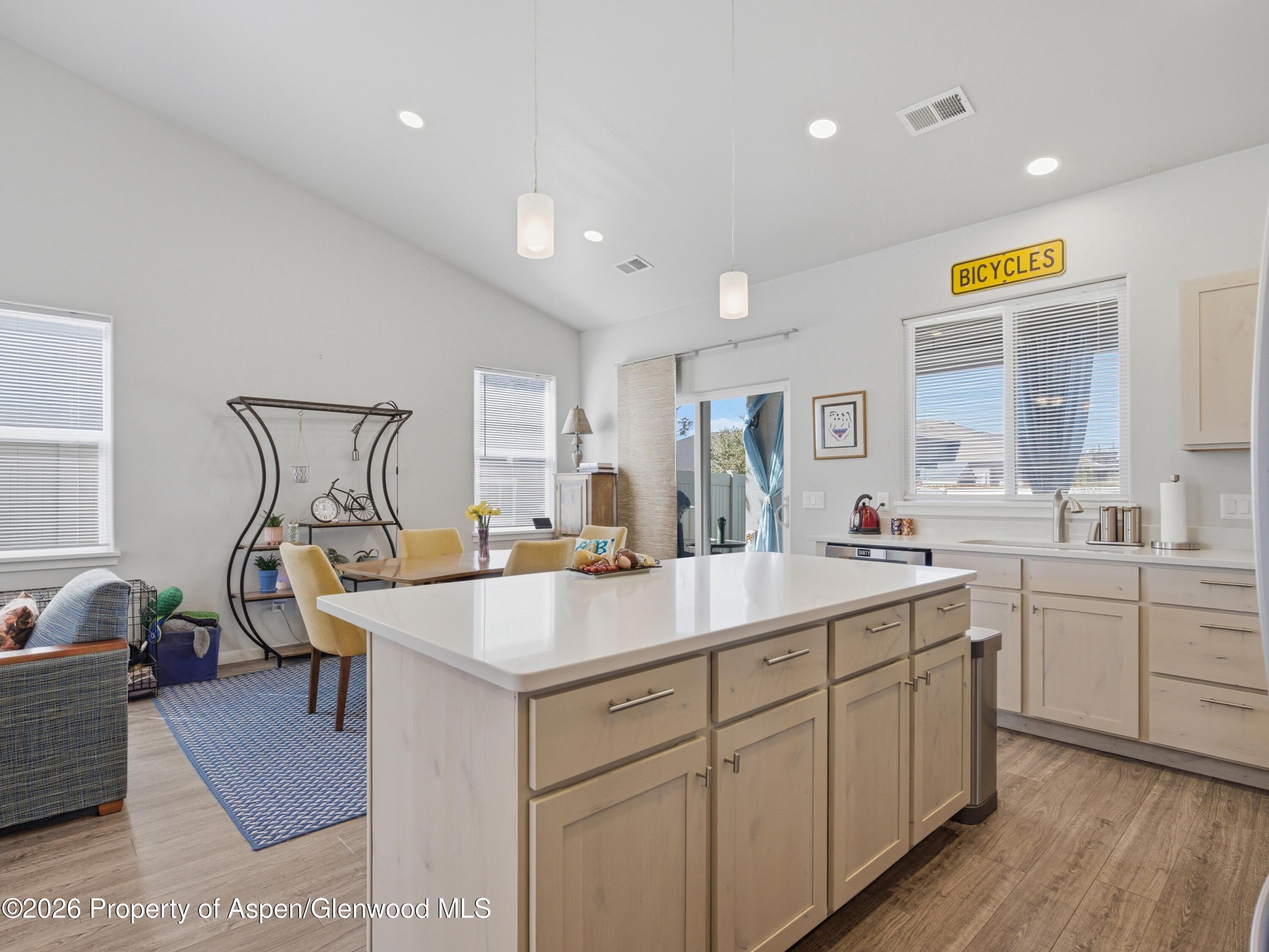 563 Red Cedar Way Grand Junction, CO 81504 - Photo 11 of 30 a kitchen with a sink appliances and cabinets