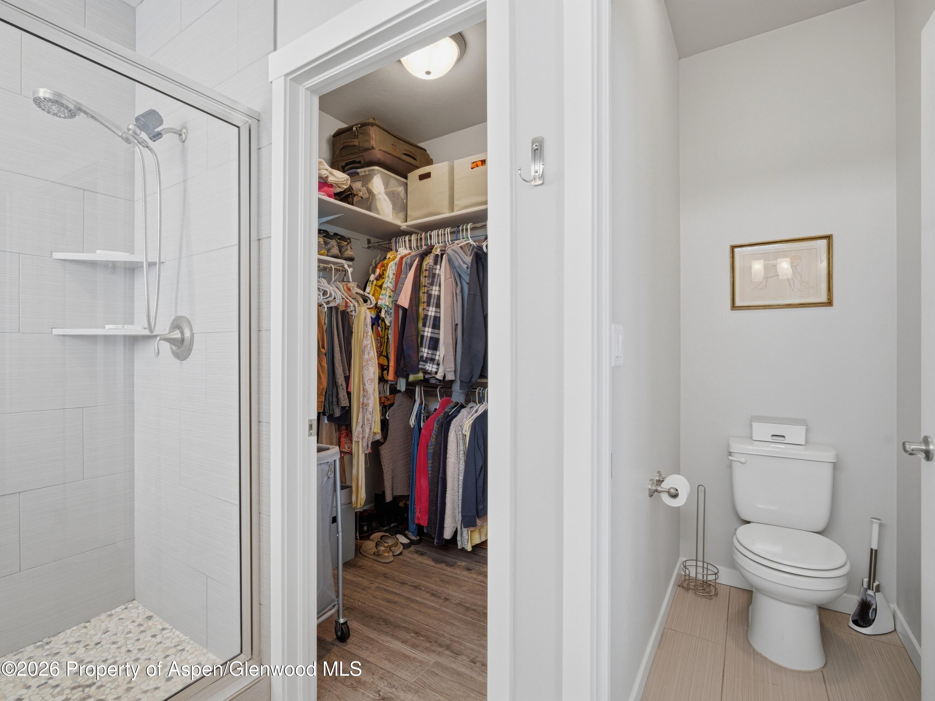 563 Red Cedar Way Grand Junction, CO 81504 - Photo 19 of 30 a view of a bedroom from a hallway