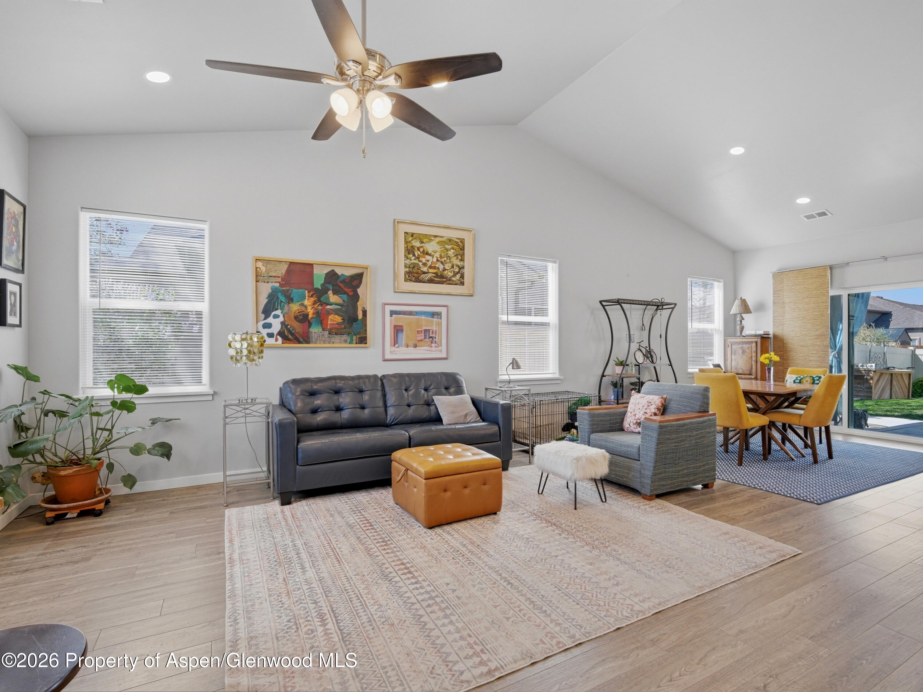 563 Red Cedar Way Grand Junction, CO 81504 - Photo 4 of 30 a living room with furniture and a window