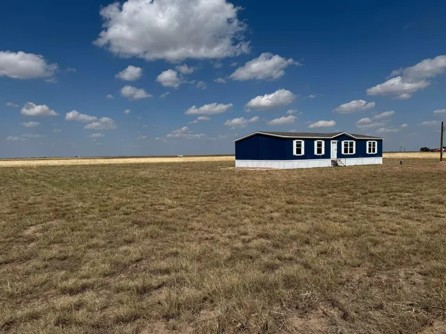 a view of an ocean and mountain