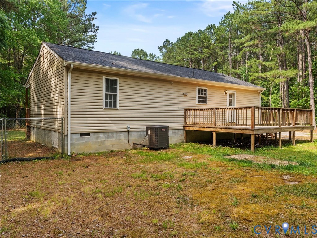 14175 Lebanon Road Disputanta, VA 23842 - Photo 39 of 60 Rear exterior featuring a large wooden deck with r