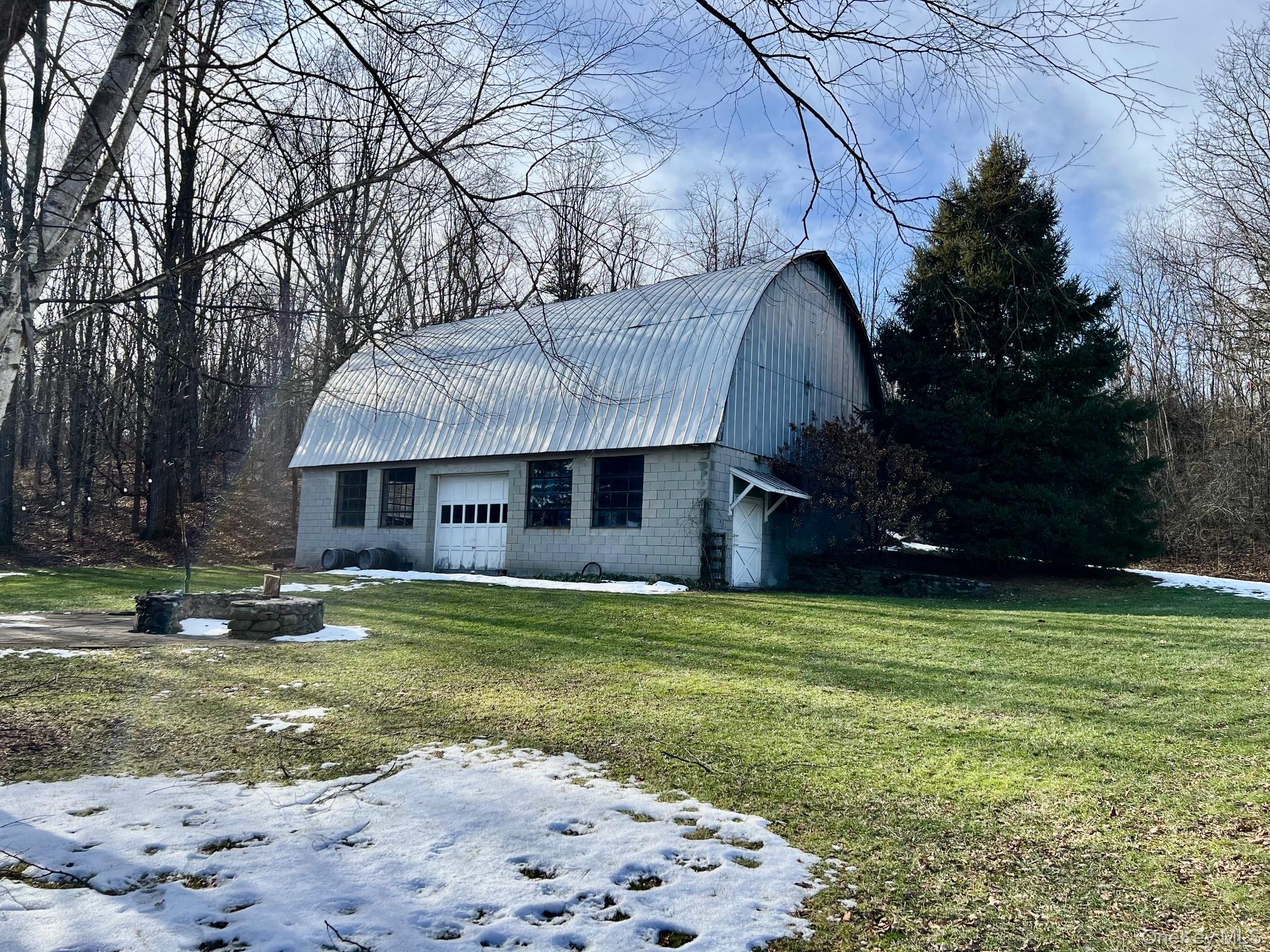 819 Van Wagner Road Poughkeepsie, NY 12601 - Photo 41 of 44 a view of a house with a yard
