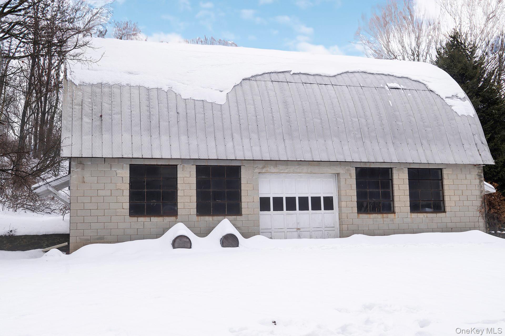 819 Van Wagner Road Poughkeepsie, NY 12601 - Photo 9 of 44 a view of a white building