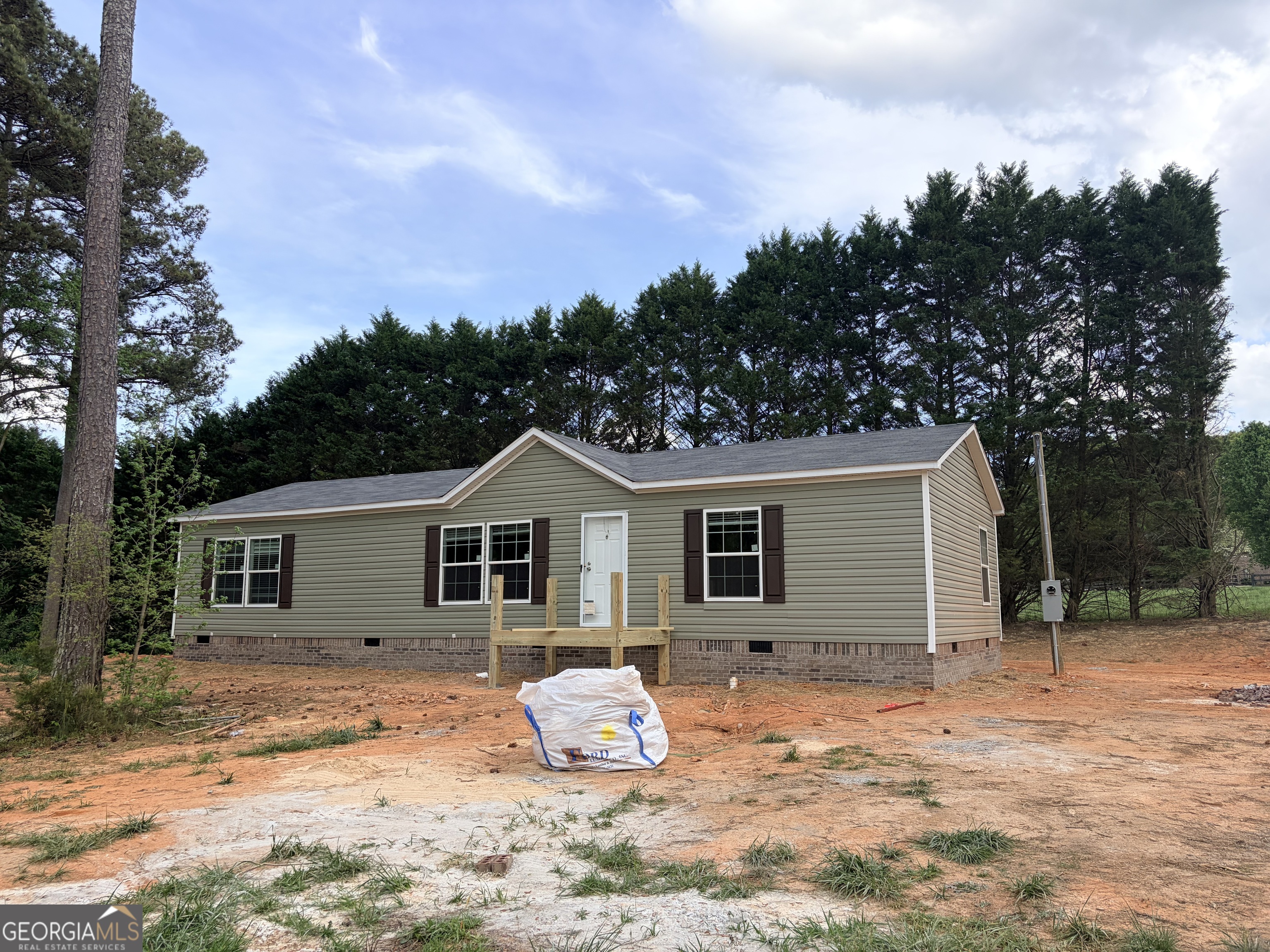225 Rehoboth Road Bowman, GA 30624 - Photo 2 of 18 a house with outdoor space