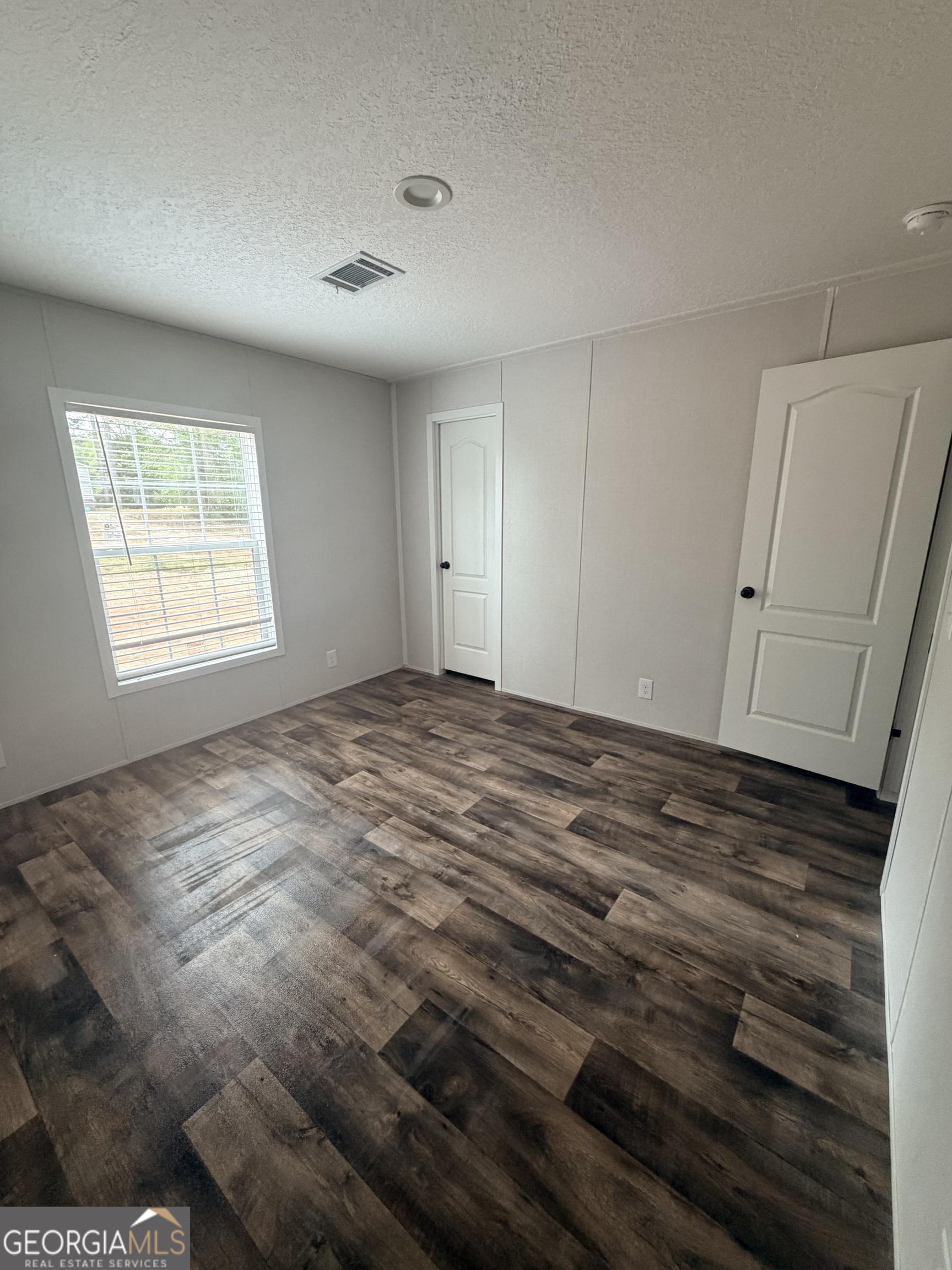 225 Rehoboth Road Bowman, GA 30624 - Photo 6 of 18 a view of room and window
