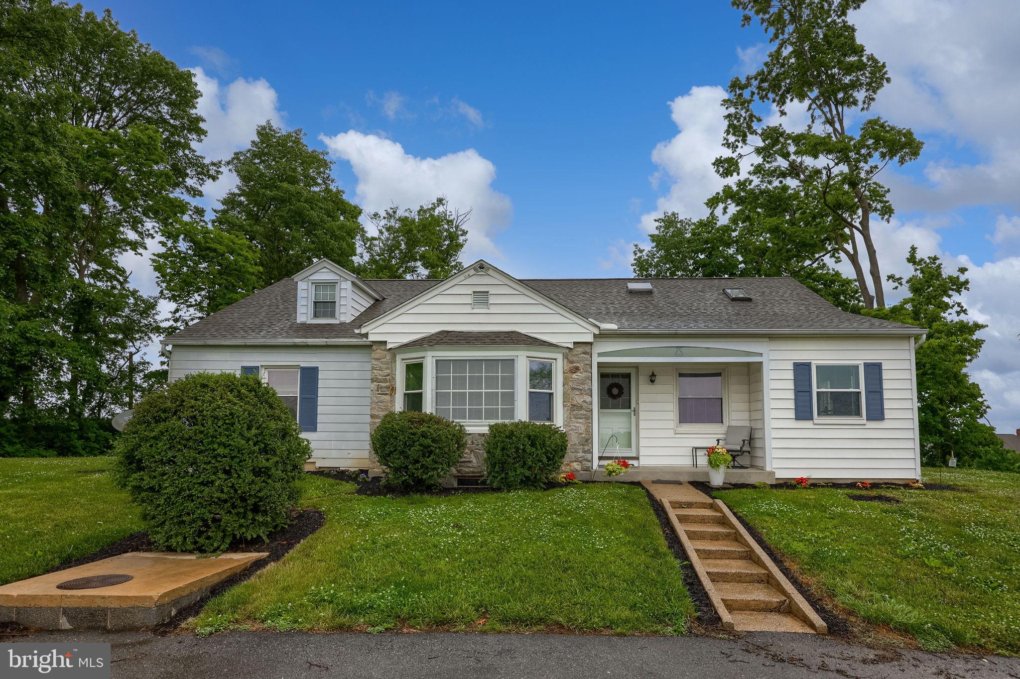 145 Weaver Road Lancaster, PA 17603 - Photo 1 of 87 a front view of a house with a yard