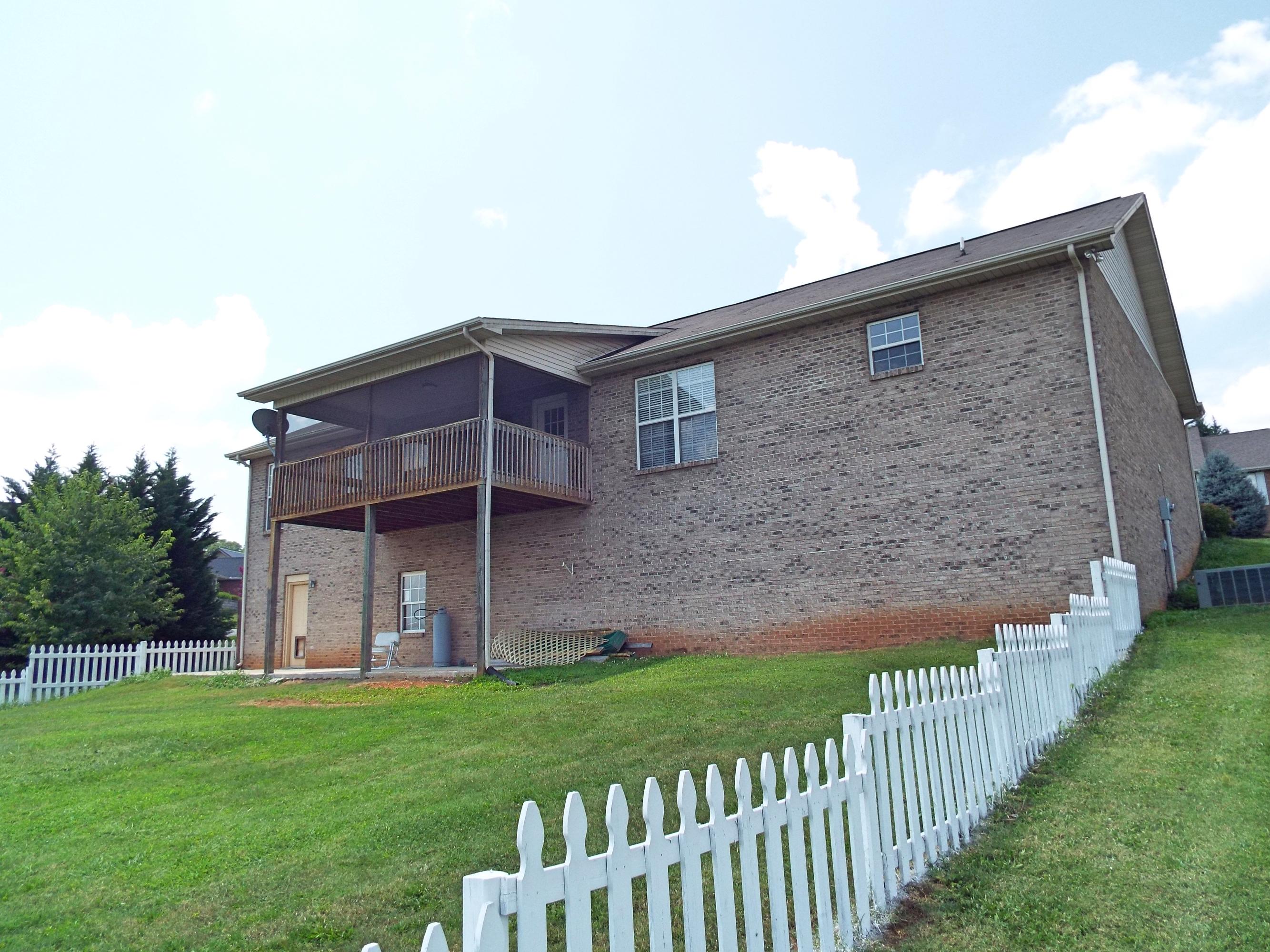 5619 J. Riley W Drive Greenback, TN 37742 - Photo 26 of 34 Back View of Home & Screened Porch
