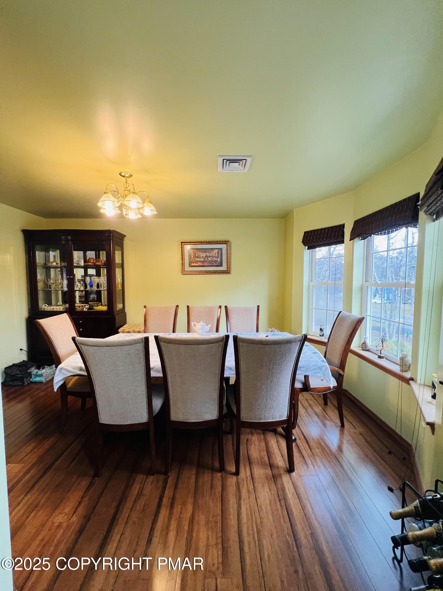 4373 Pine Ridge Drive East Bushkill, PA 18324 - Photo 12 of 39 a view of a dining room with furniture and wooden floor