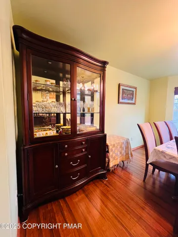 a bed room with a bed and a chair