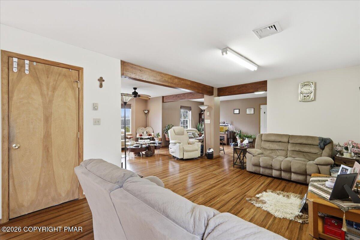 4373 Pine Ridge Drive East Bushkill, PA 18324 - Photo 19 of 33 a living room with furniture and a couch