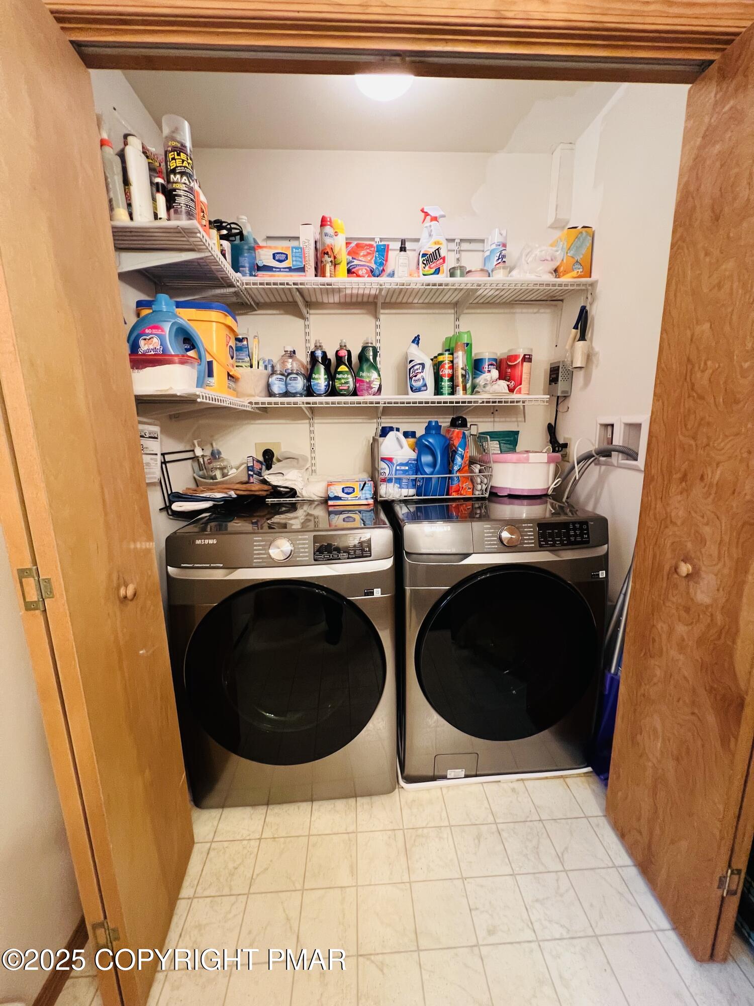 4373 Pine Ridge Drive East Bushkill, PA 18324 - Photo 27 of 39 a kitchen with stainless steel appliances a stove a refrigerator and a sink