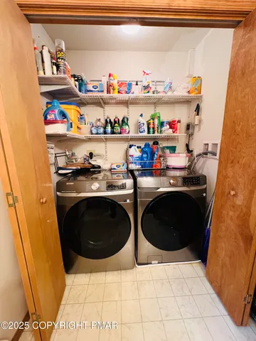 a kitchen with stainless steel appliances a stove a refrigerator and a sink