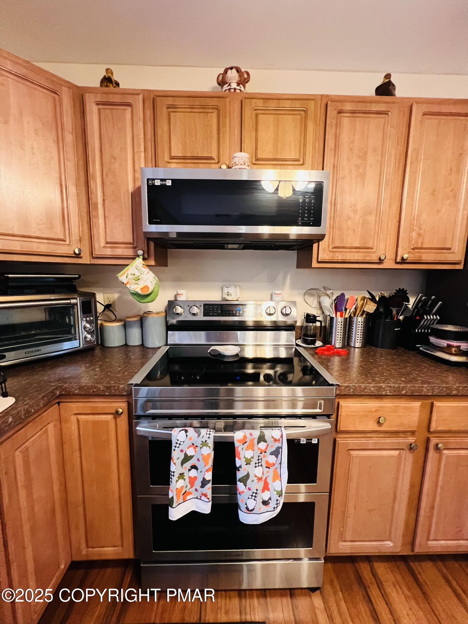 4373 Pine Ridge Drive East Bushkill, PA 18324 - Photo 3 of 39 a stove top oven sitting inside of a kitchen