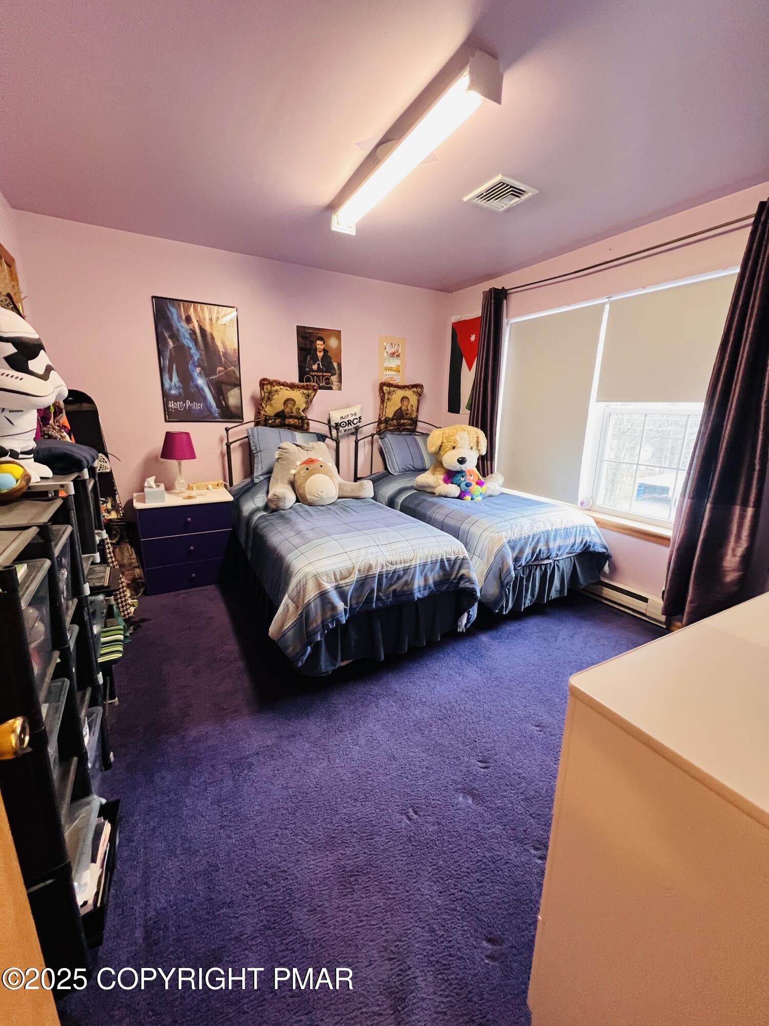 4373 Pine Ridge Drive East Bushkill, PA 18324 - Photo 31 of 39 a bedroom with bed and glass door