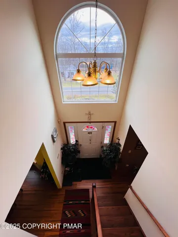 a view of living room with a wooden floor