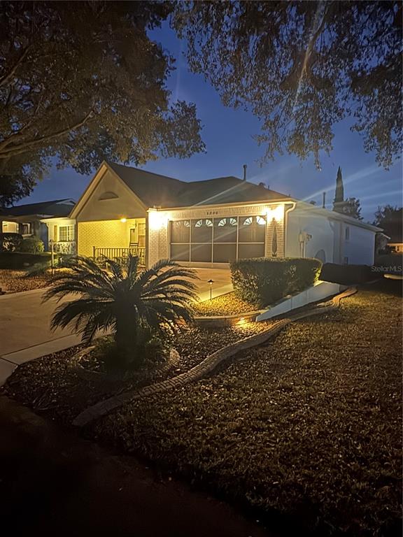 9746 Southwest 96th Street Ocala, FL 34481 - Photo 3 of 57 a view of a yard