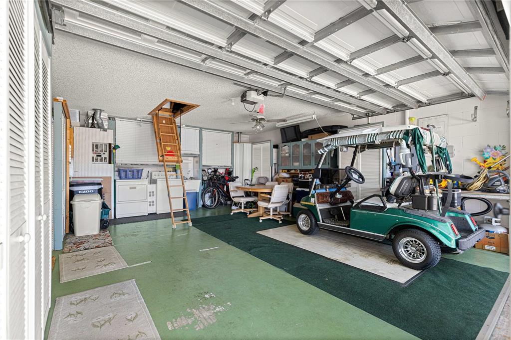 9746 Southwest 96th Street Ocala, FL 34481 - Photo 40 of 57 a view of a garage with furniture