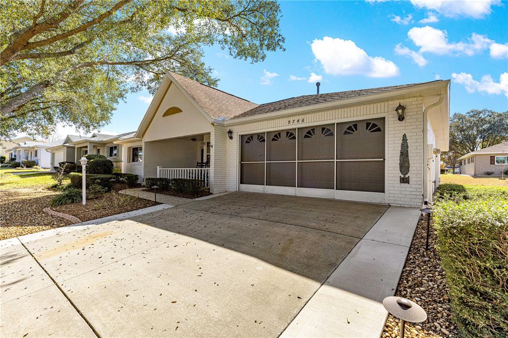 9746 Southwest 96th Street Ocala, FL 34481 - Photo 46 of 57 a view of a house with a patio