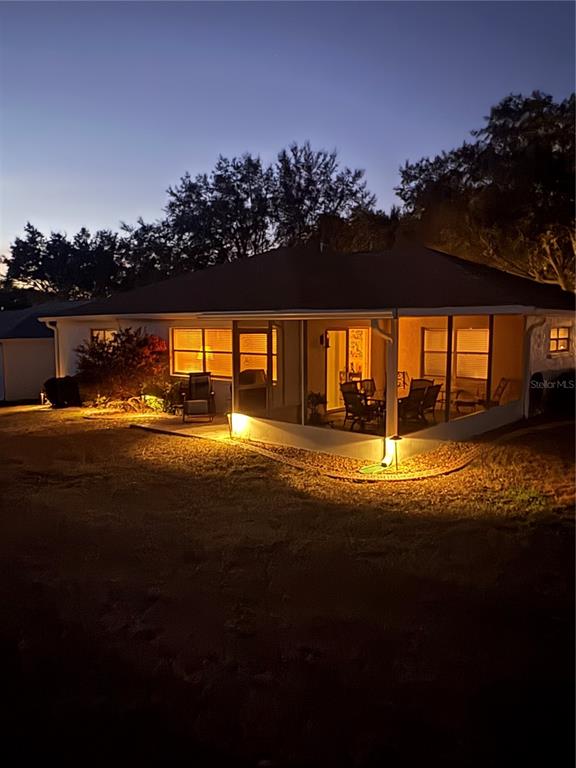 9746 Southwest 96th Street Ocala, FL 34481 - Photo 52 of 57 a view of swimming pool and an outdoor seating