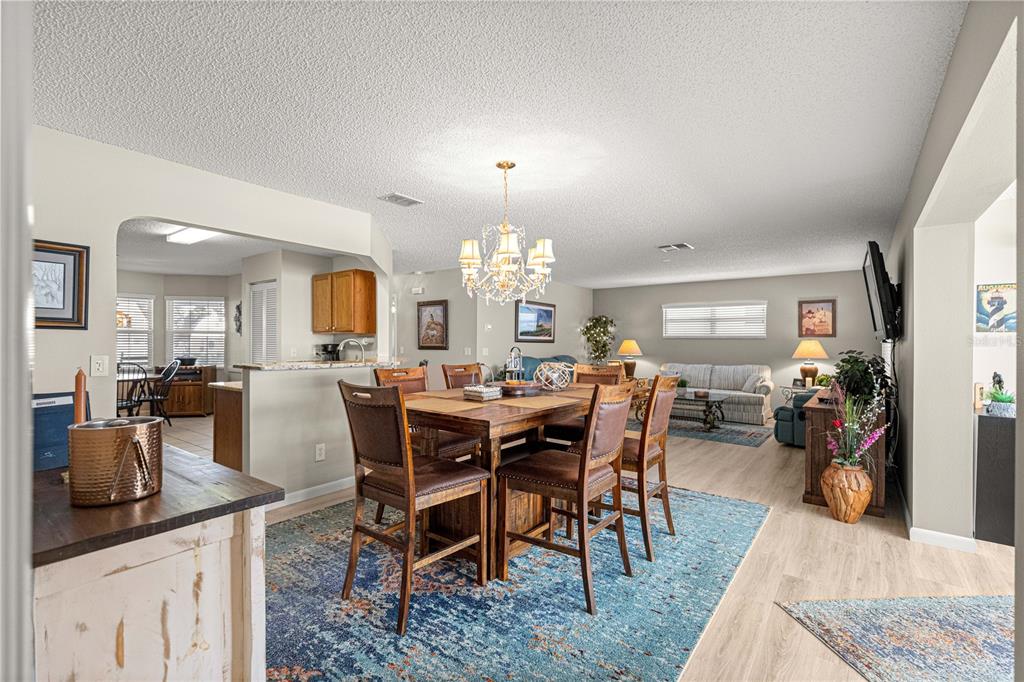 9746 Southwest 96th Street Ocala, FL 34481 - Photo 8 of 57 a view of a dining room with furniture