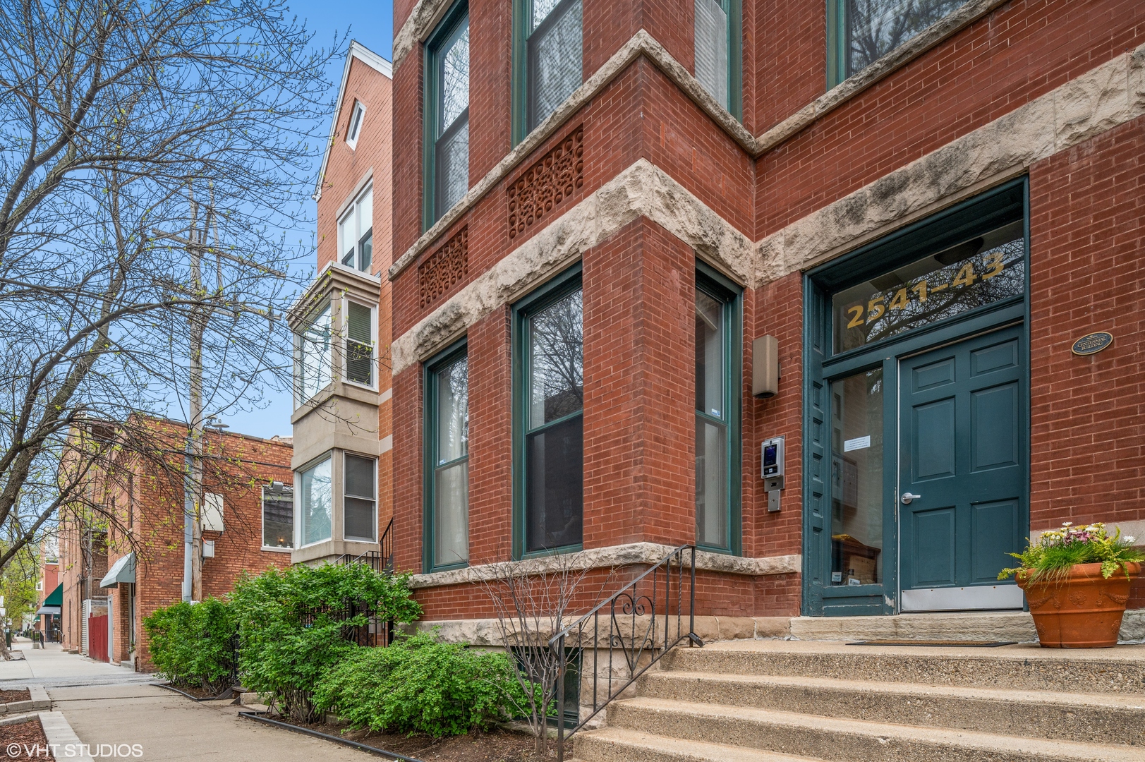 a view of a building with brick walls