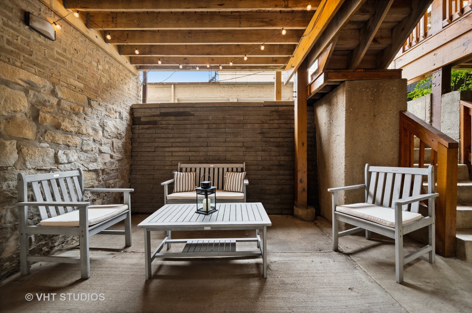 2543 North Racine Avenue, Unit G Chicago, IL 60614 - Photo 14 of 15 a roof deck with a table and chairs