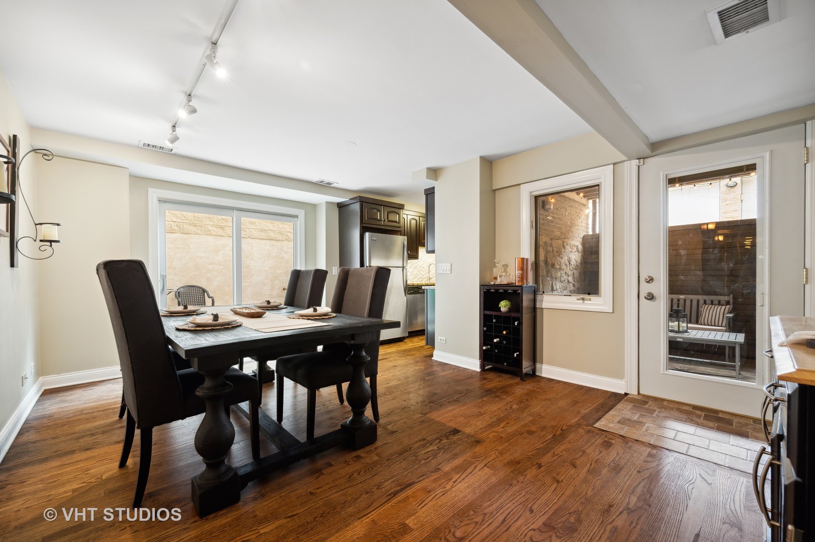 2543 North Racine Avenue, Unit G Chicago, IL 60614 - Photo 4 of 15 a view of a dining room with furniture and wooden floor